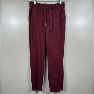Lululemon On the Fly 7/8 Pant Dark Adobe Maroon Red Size 4